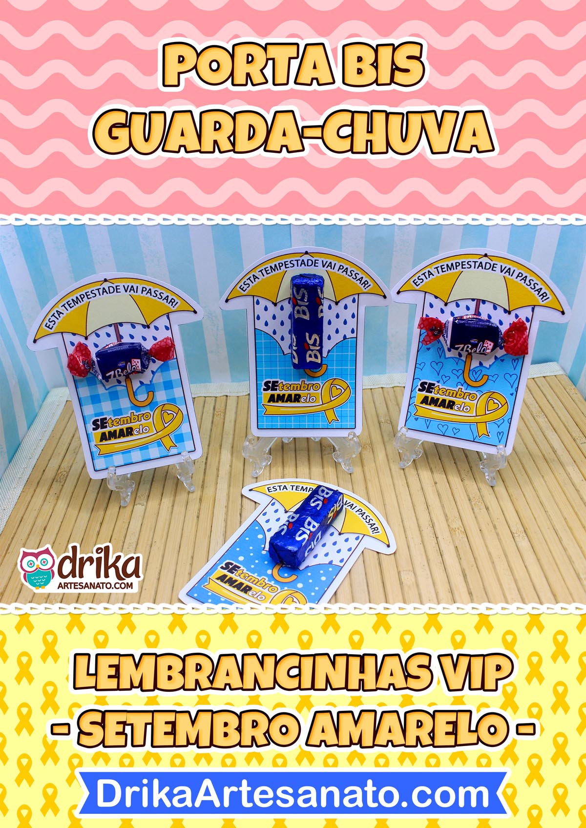 Três porta-bis de papel com tema de guarda-chuva e laço amarelo dispostos sobre uma base de madeira clara